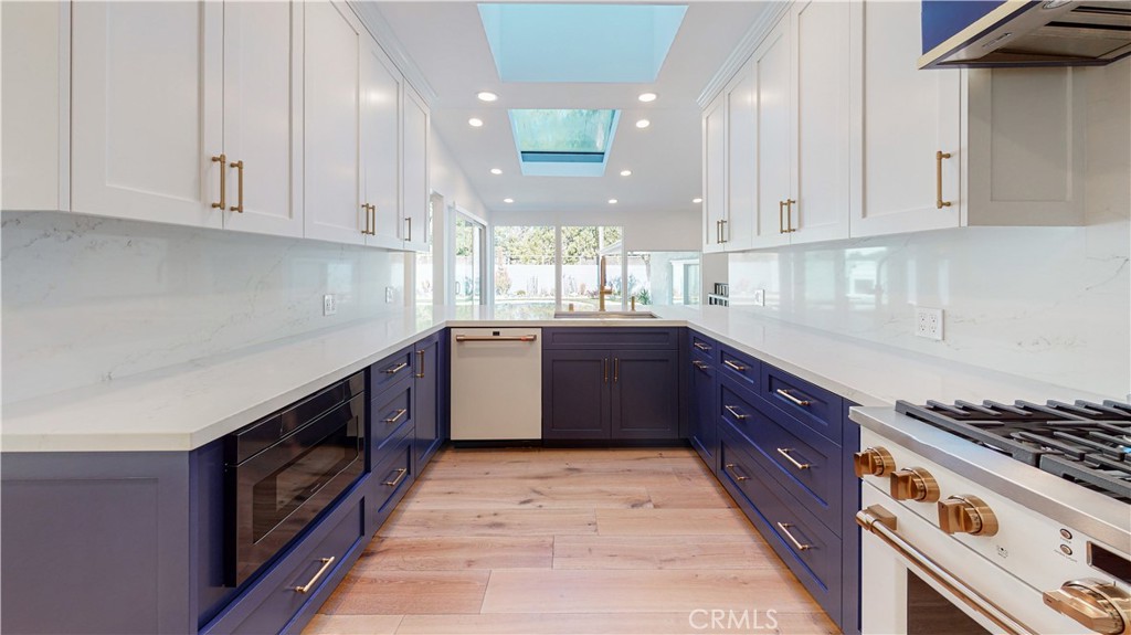 11165 Valley Spring Lane Studio City, CA 91602 - Photo 3 of 44 GE Cafe Appliances and Skylights in Ceiling