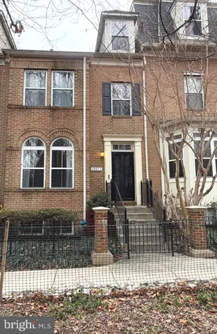 a front view of a house with glass windows