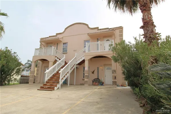 front view of a house with a staircase