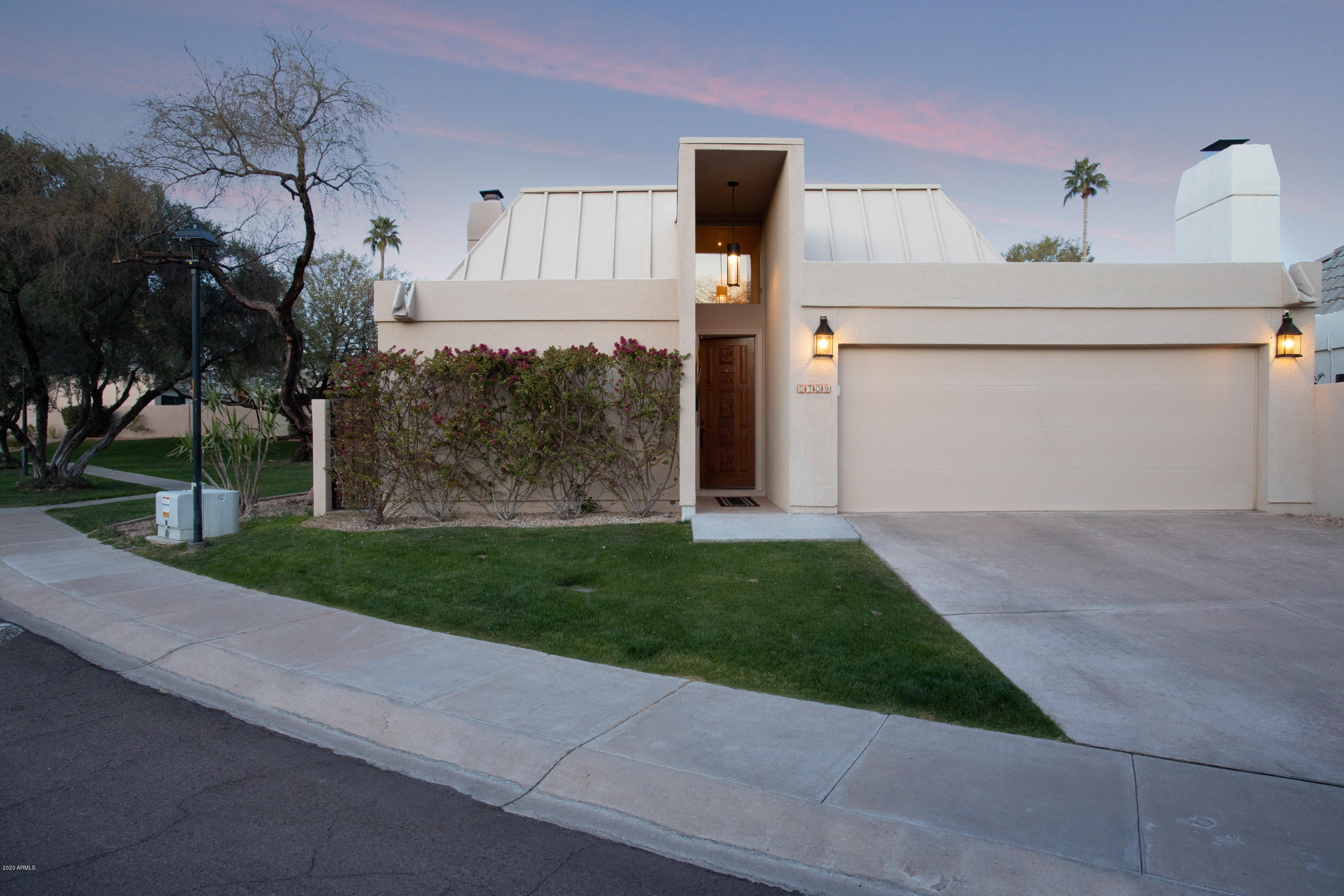 5309 North 24th Place Phoenix, AZ 85016 - Photo 2 of 49 a front view of a house with garden