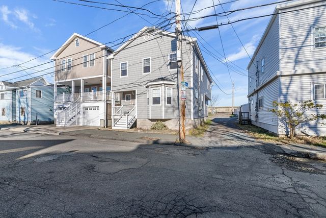 a view of a building with a street