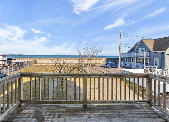 a view of a street from a balcony