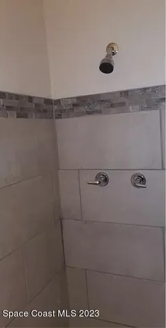 a close view of a shower in the bathroom