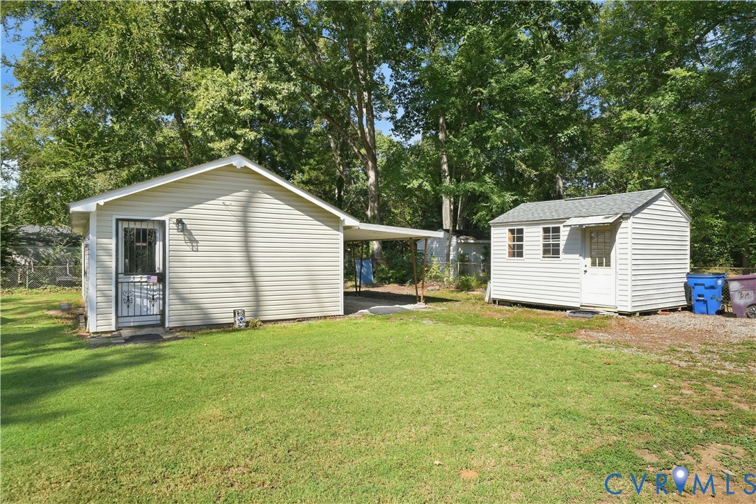 2406 McRae Road Richmond, VA 23235 - Photo 29 of 40 A detached workshop (on left) provides dedicated s