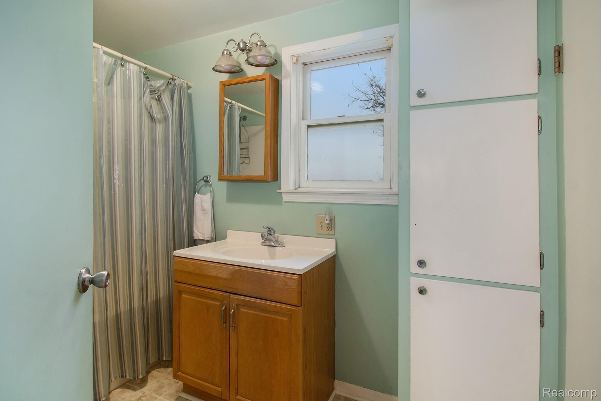 9345 Vernon Road Bancroft, MI 48414 - Photo 12 of 23 main floor bathroom
