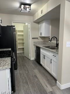 7885 West Flamingo Road, Unit 2004 Las Vegas, NV 89147 - Photo 3 of 23 This modern kitchen features sleek countertops and ample storage, ideal for culinary adventures.