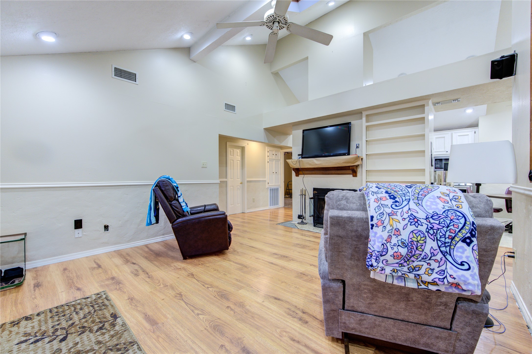 11217 Todd Street Houston, TX 77055 - Photo 9 of 49 a living room with furniture and a flat screen tv