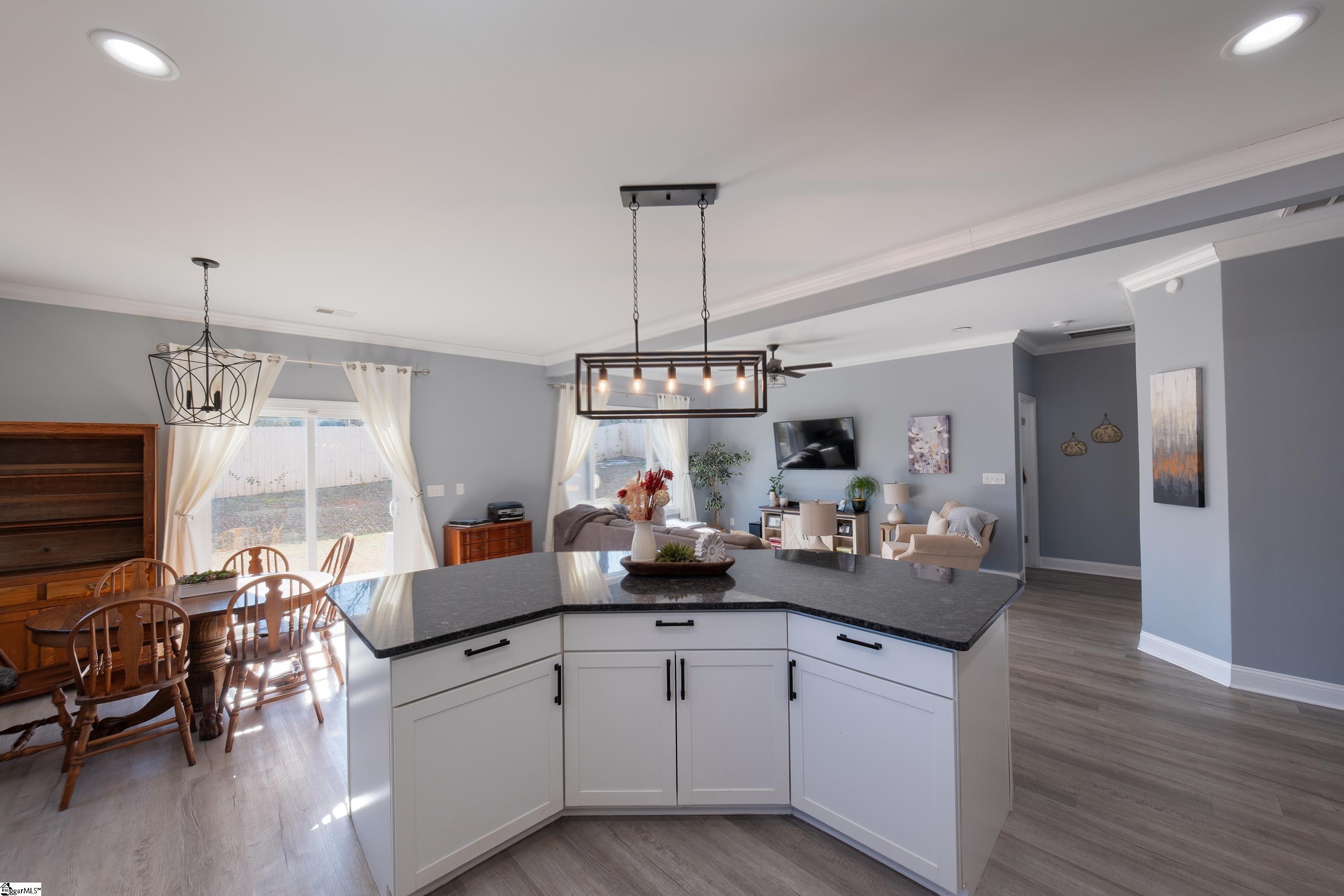206 East Tucker Street Landrum, SC 29356 - Photo 3 of 20 Open concept - large kitchen island view to living room
