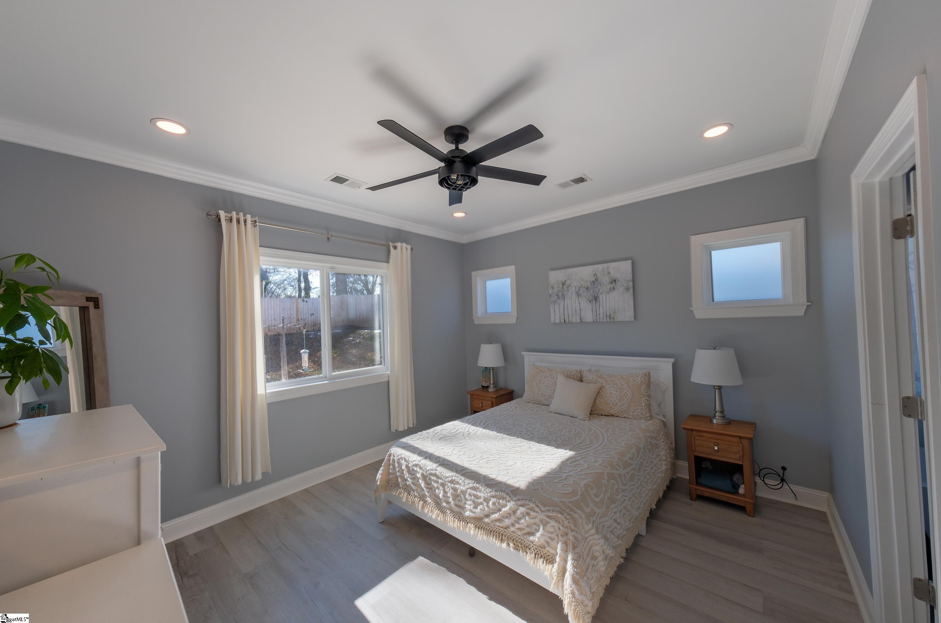 206 East Tucker Street Landrum, SC 29356 - Photo 7 of 20 Primary bedroom off the living room, opposite side of the guest bedrooms