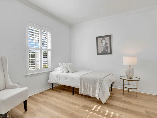 a bathroom with a sink a toilet and shower curtain