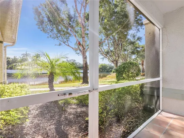a view of a lake from a balcony