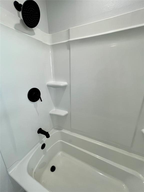 4203 Weiland Road Weatherford, TX 76088 - Photo 19 of 29 a bathroom with a window