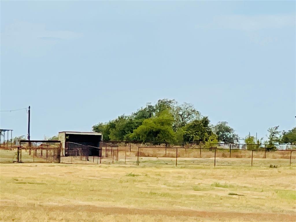 4203 Weiland Road Weatherford, TX 76088 - Photo 27 of 29 a swimming pool with lawn chairs