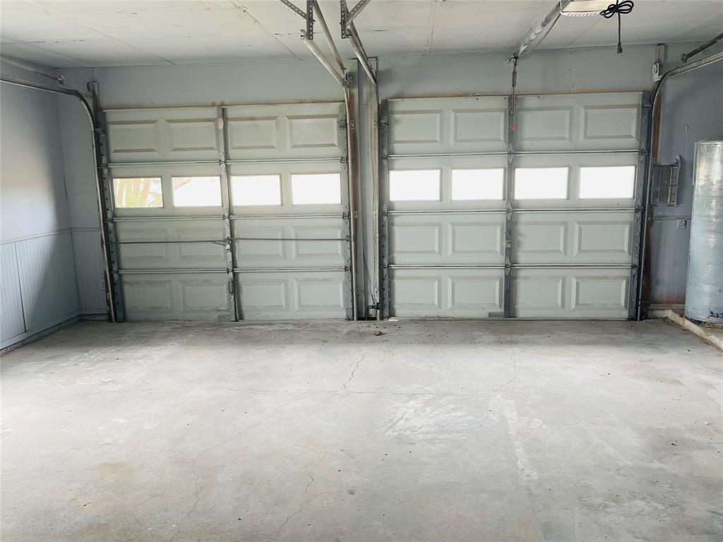 4203 Weiland Road Weatherford, TX 76088 - Photo 6 of 29 wooden view of an empty room with a window