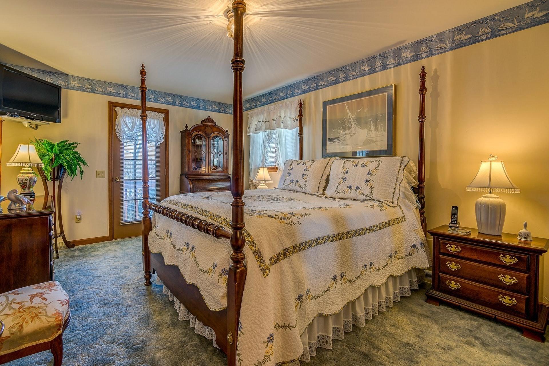 3624 Kemp Ford Road Union Hall, VA 24176 - Photo 20 of 60 a bed room with a bed window and a flat screen tv