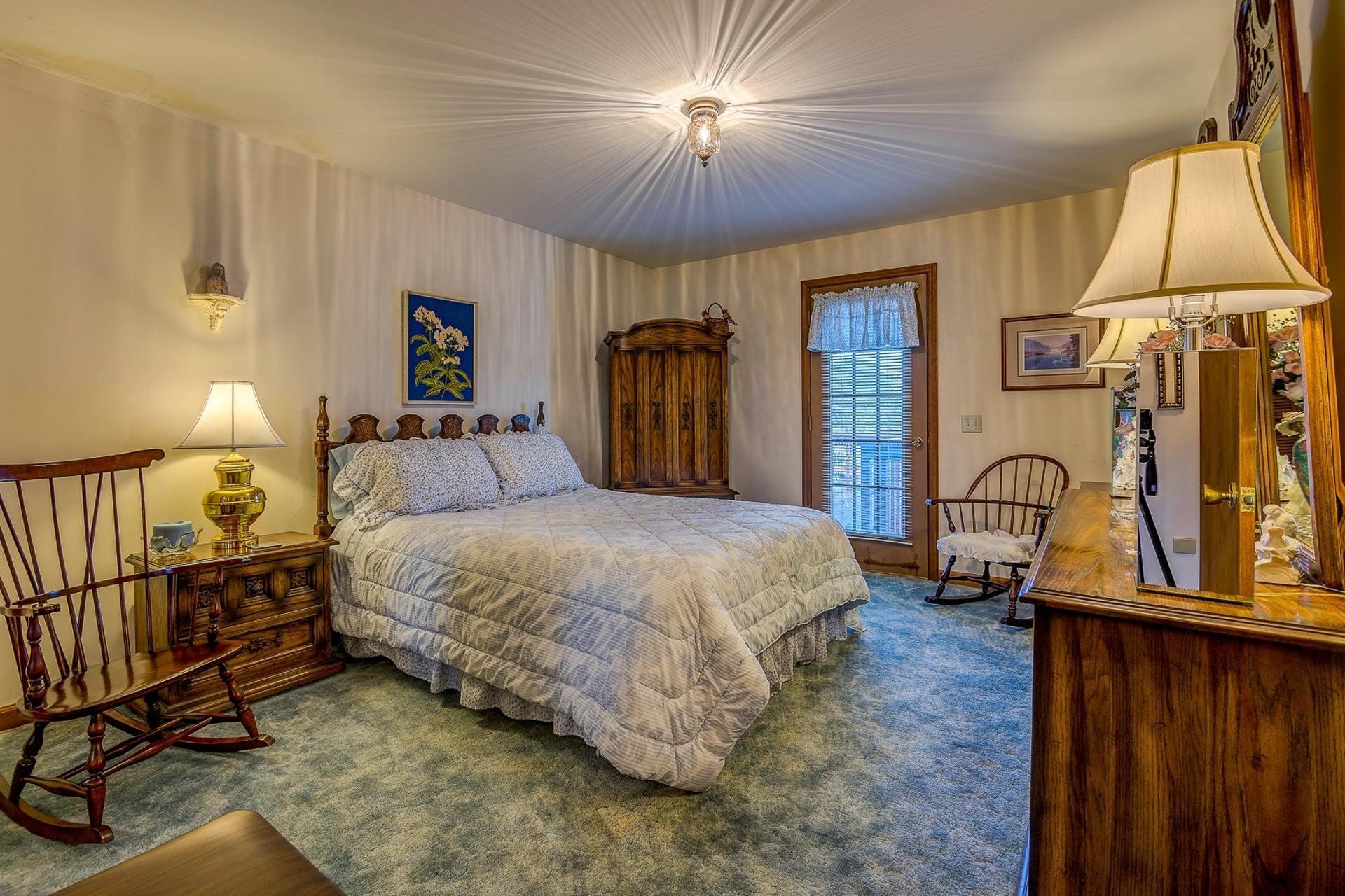 3624 Kemp Ford Road Union Hall, VA 24176 - Photo 22 of 60 a spacious bedroom with a bed and a dresser