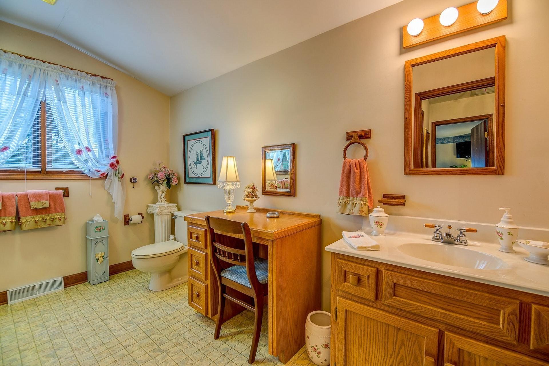 3624 Kemp Ford Road Union Hall, VA 24176 - Photo 23 of 60 a bathroom with a sink and a mirror
