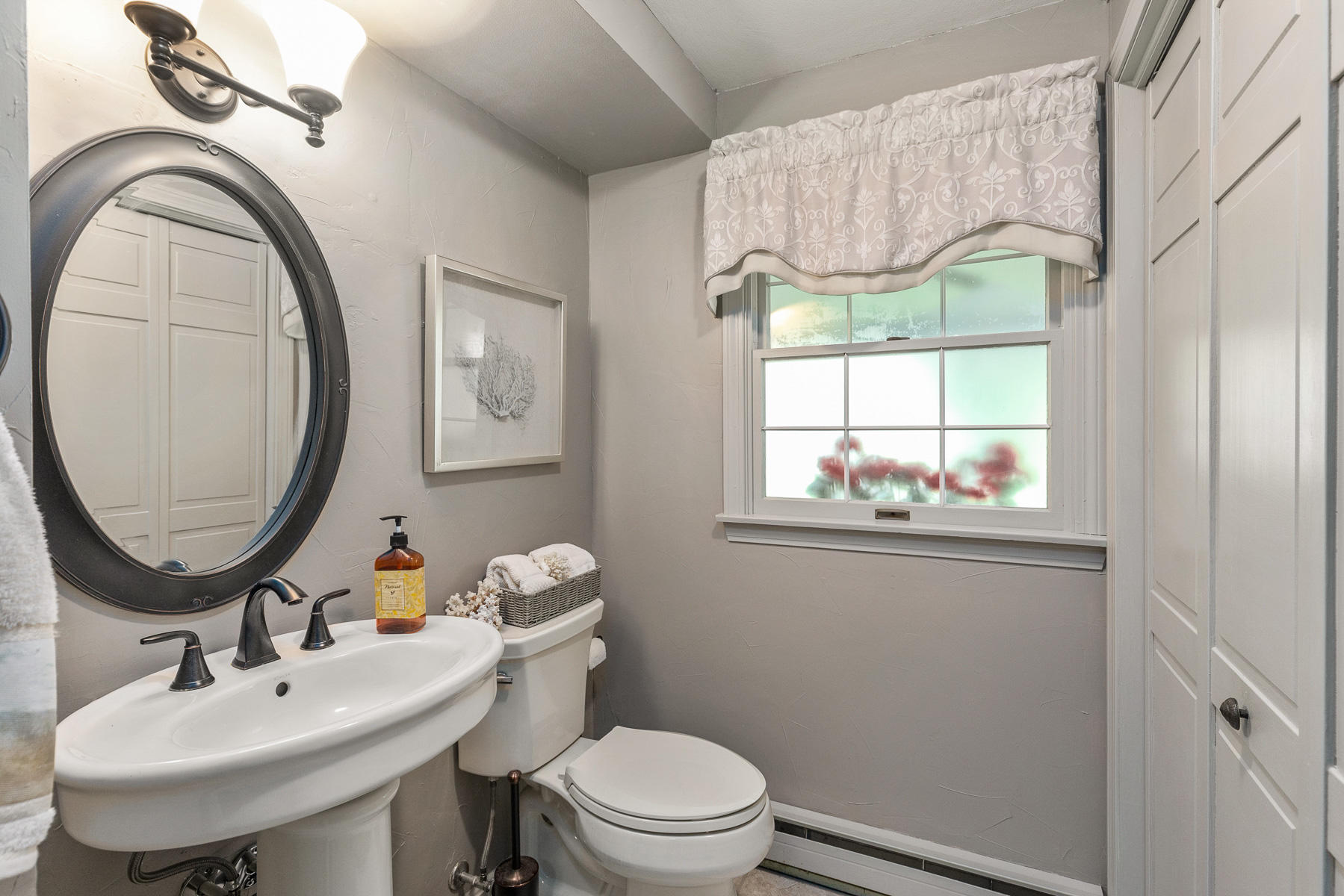 49 Ferncroft Road York, ME 03909 - Photo 22 of 37 first floor powder room and laundry