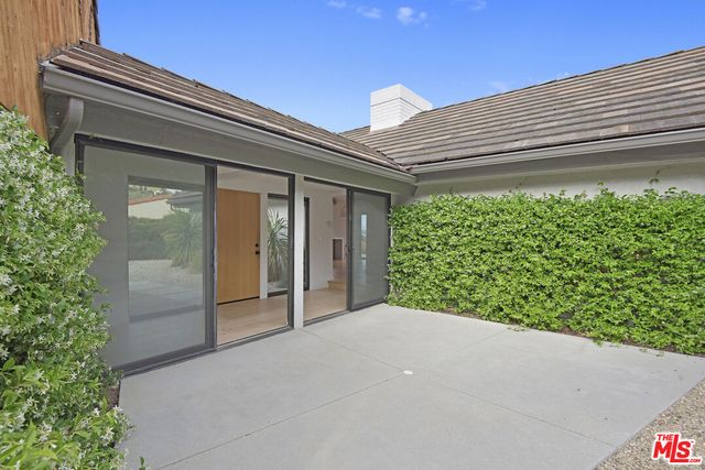 a view of a road with a yard