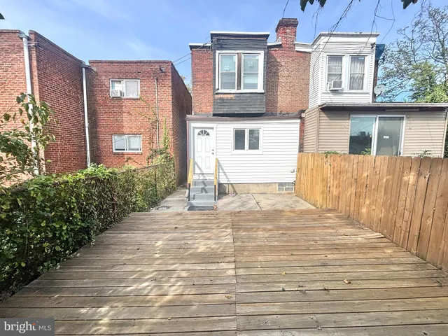 a view of a building with a bench