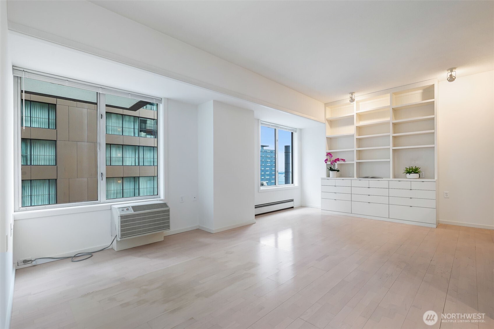 98 Union Street, Unit 408 Seattle, WA 98101 - Photo 2 of 30 a view of an empty room with a window