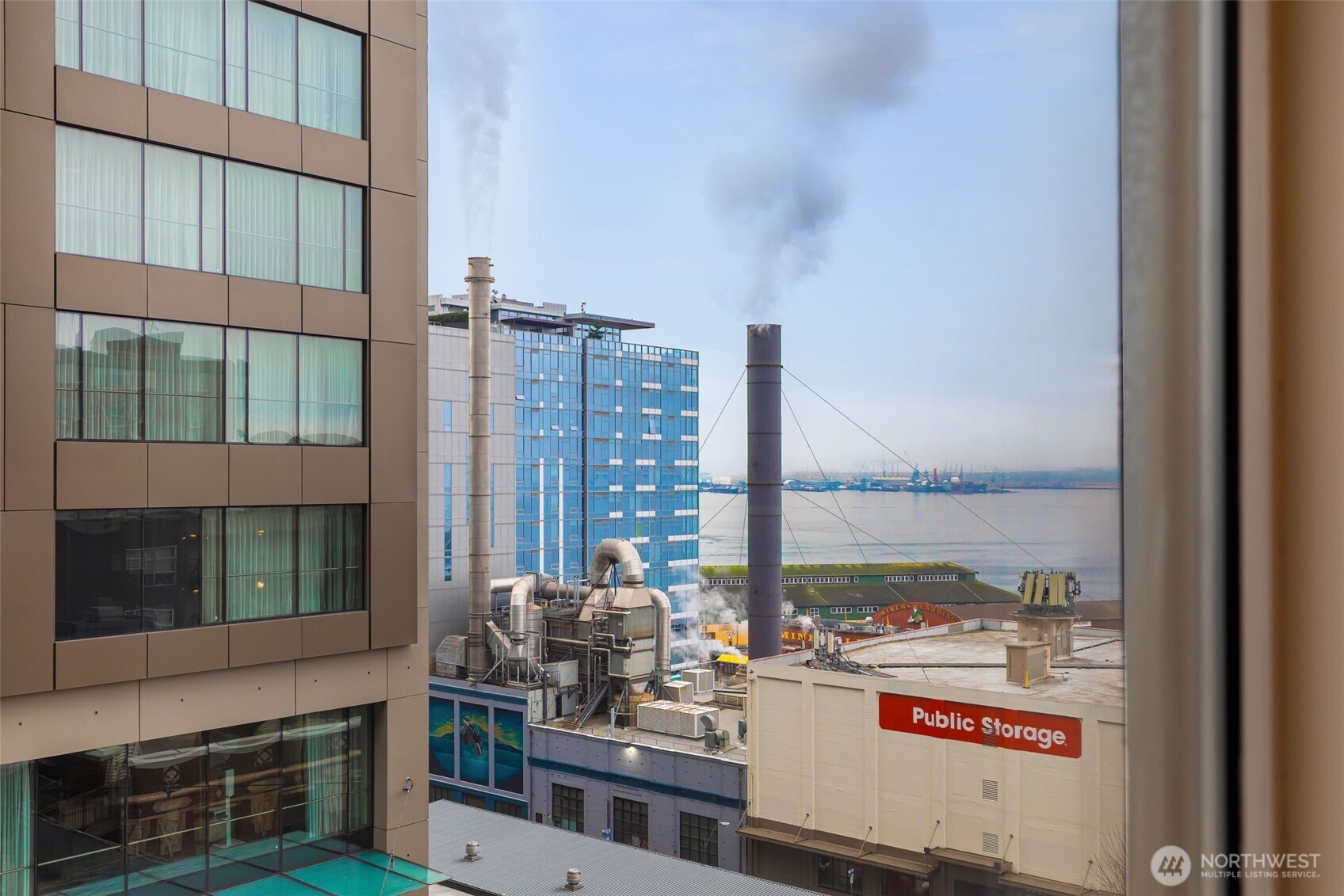 98 Union Street, Unit 408 Seattle, WA 98101 - Photo 4 of 30 a view of a city from a living room