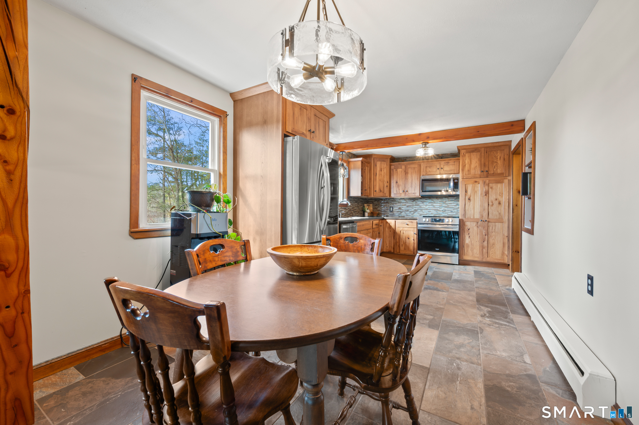 64 Westford Road Eastford, CT 06242 - Photo 11 of 40 a view of a dining room with furniture window and outside view