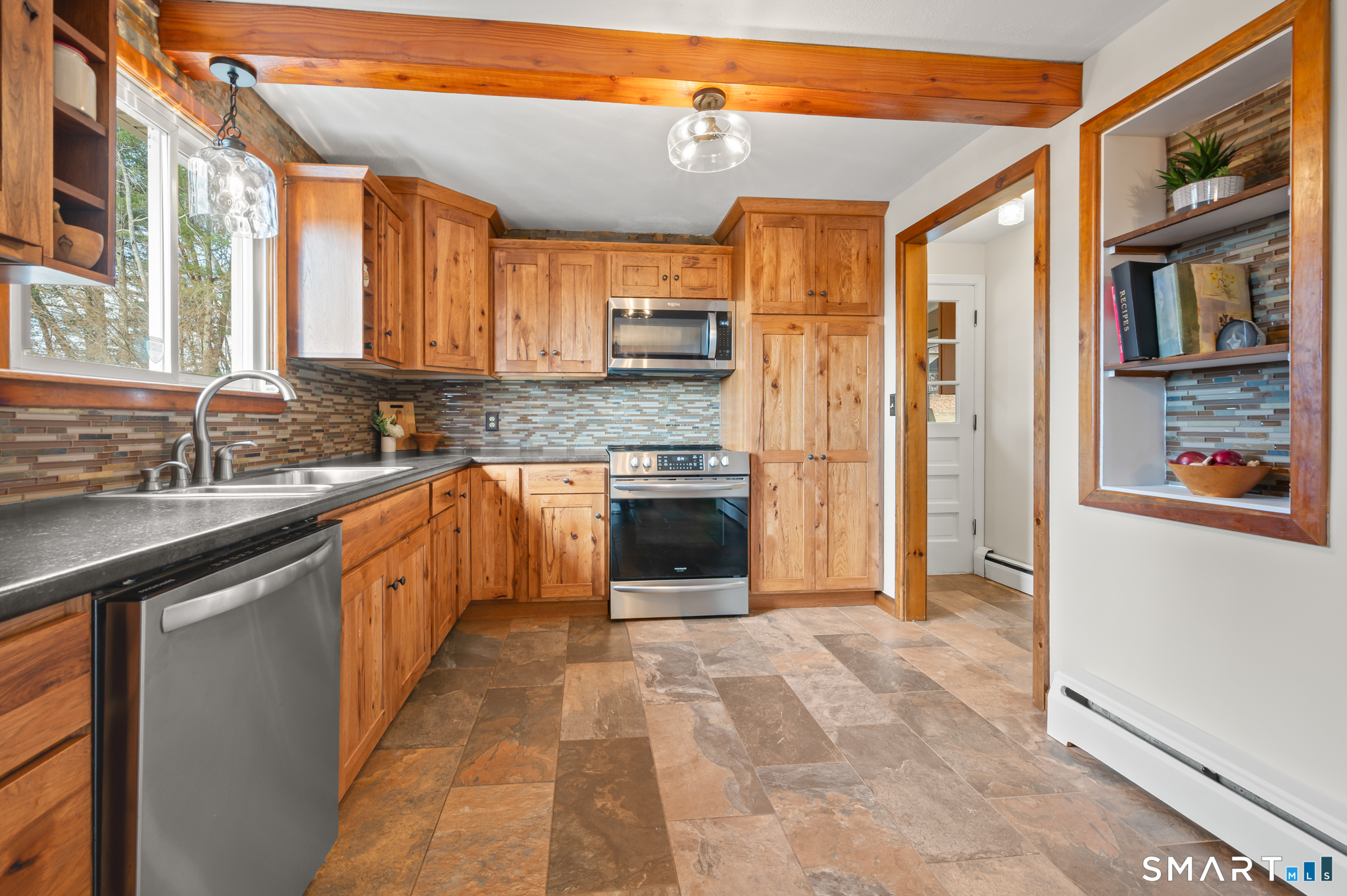 64 Westford Road Eastford, CT 06242 - Photo 12 of 40 a large kitchen with stainless steel appliances granite countertop a refrigerator and a sink