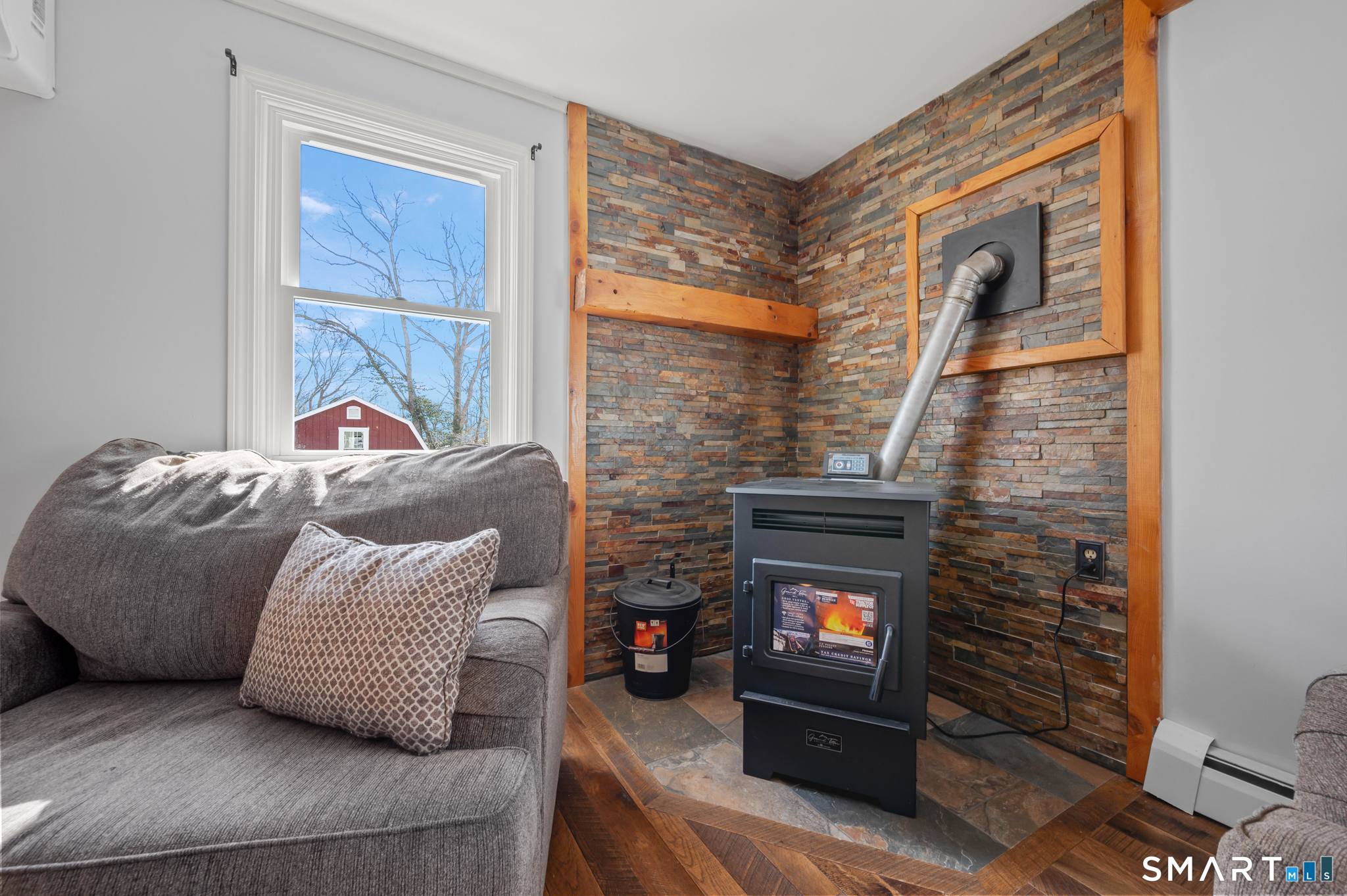 64 Westford Road Eastford, CT 06242 - Photo 17 of 40 a living room with furniture and a fireplace
