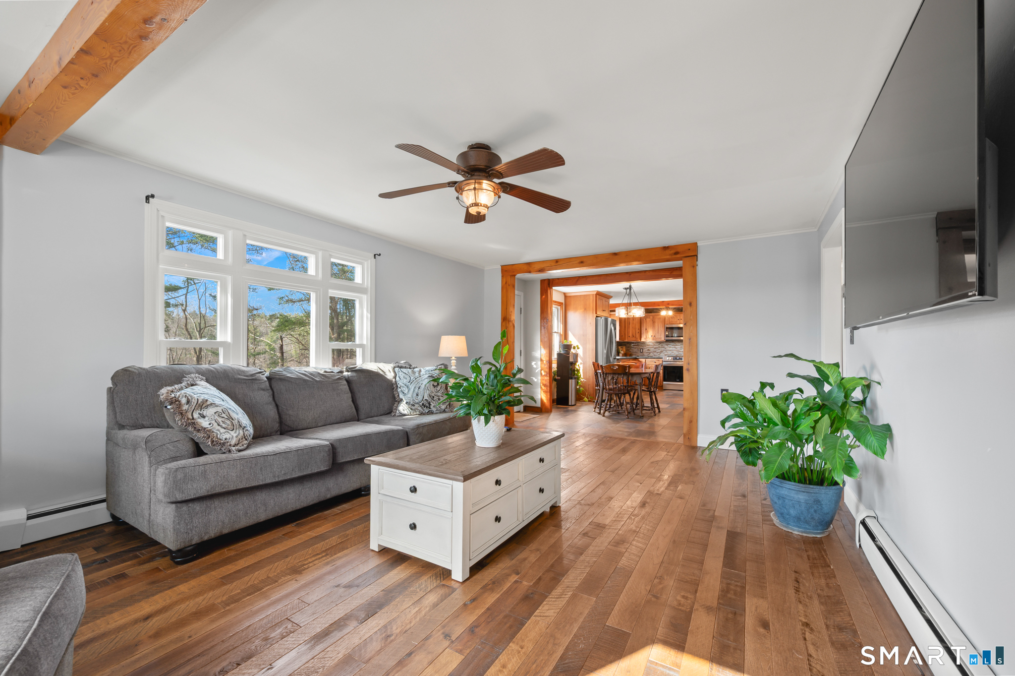 64 Westford Road Eastford, CT 06242 - Photo 18 of 40 a living room with furniture and a large window