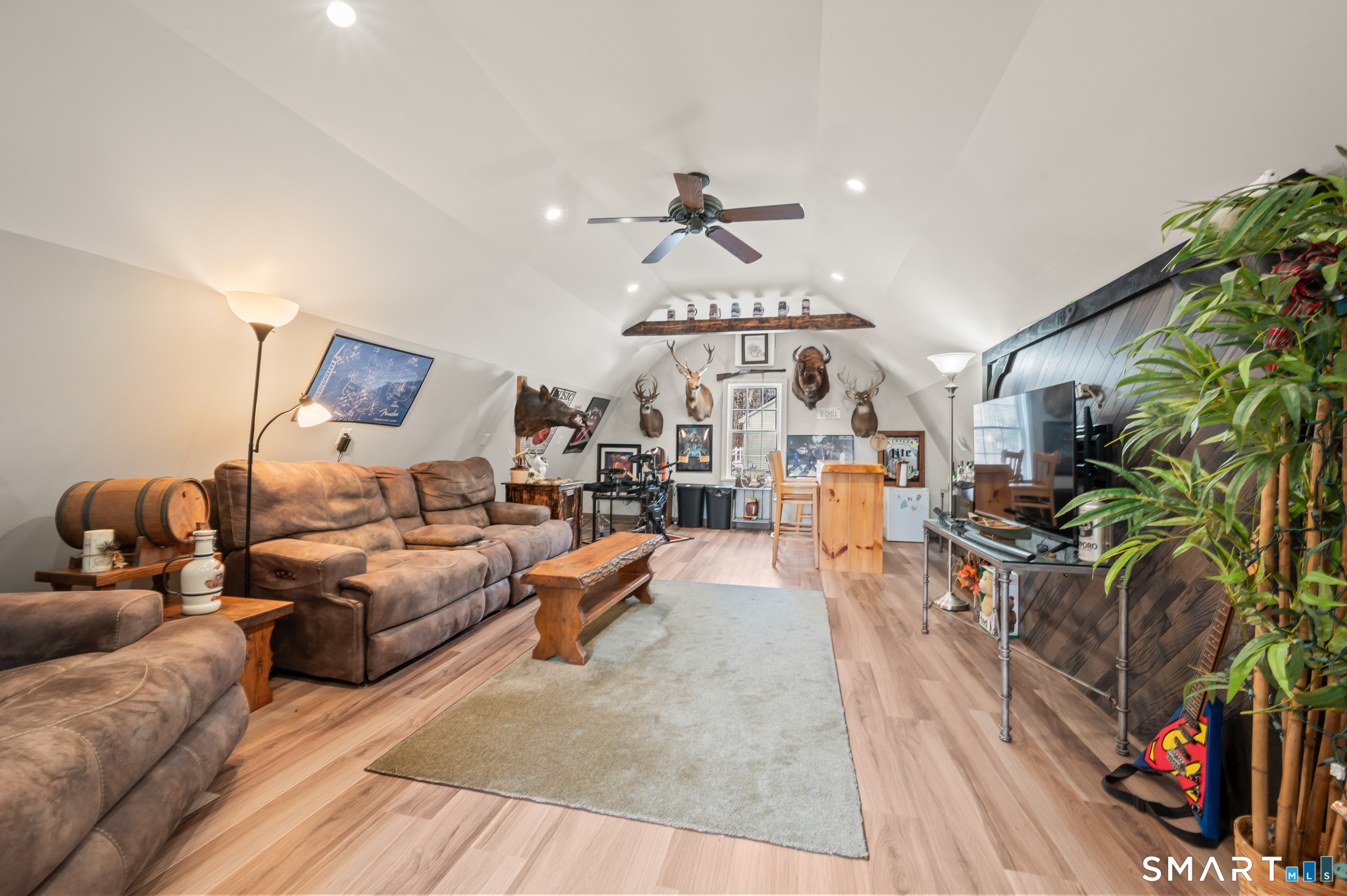 64 Westford Road Eastford, CT 06242 - Photo 39 of 40 a living room with furniture and a chandelier