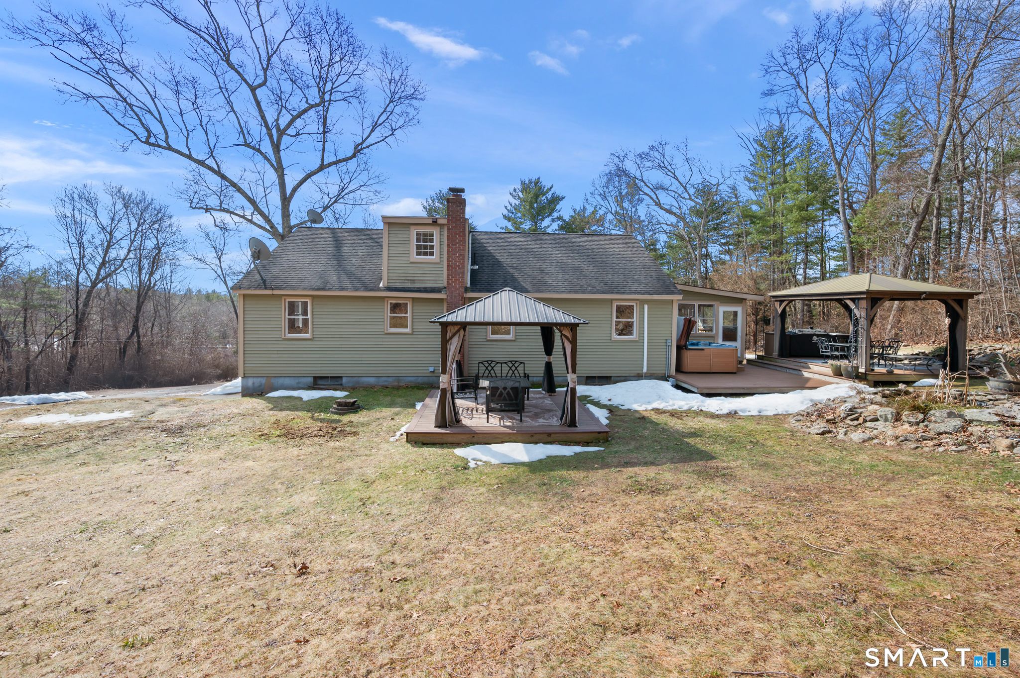 64 Westford Road Eastford, CT 06242 - Photo 4 of 40 a view of a house with a yard and sitting area