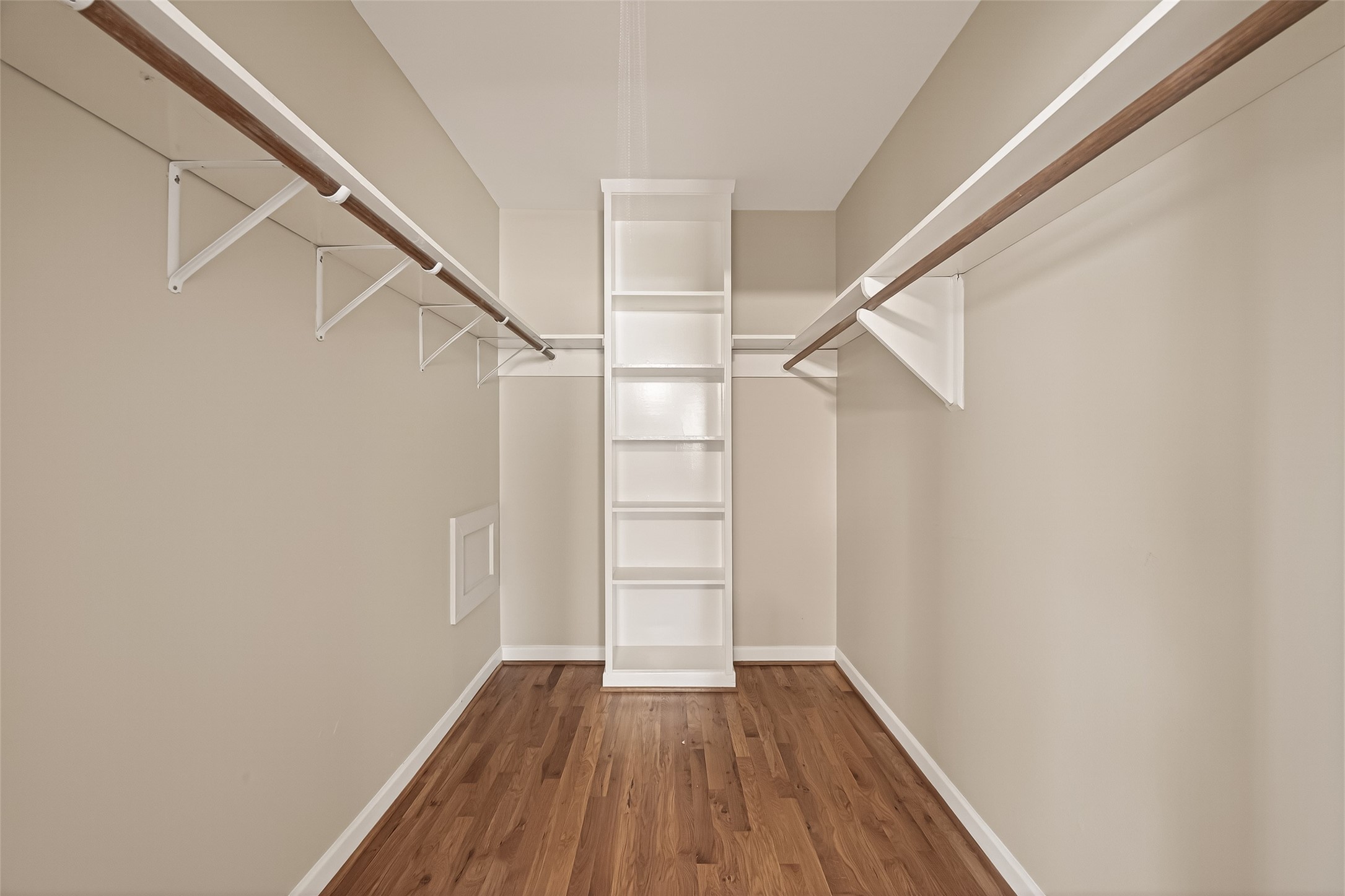 5646 Hazen Street Houston, TX 77081 - Photo 25 of 43 The oversized walk-in primary bedroom closet has built-in shelves for additional storage.
