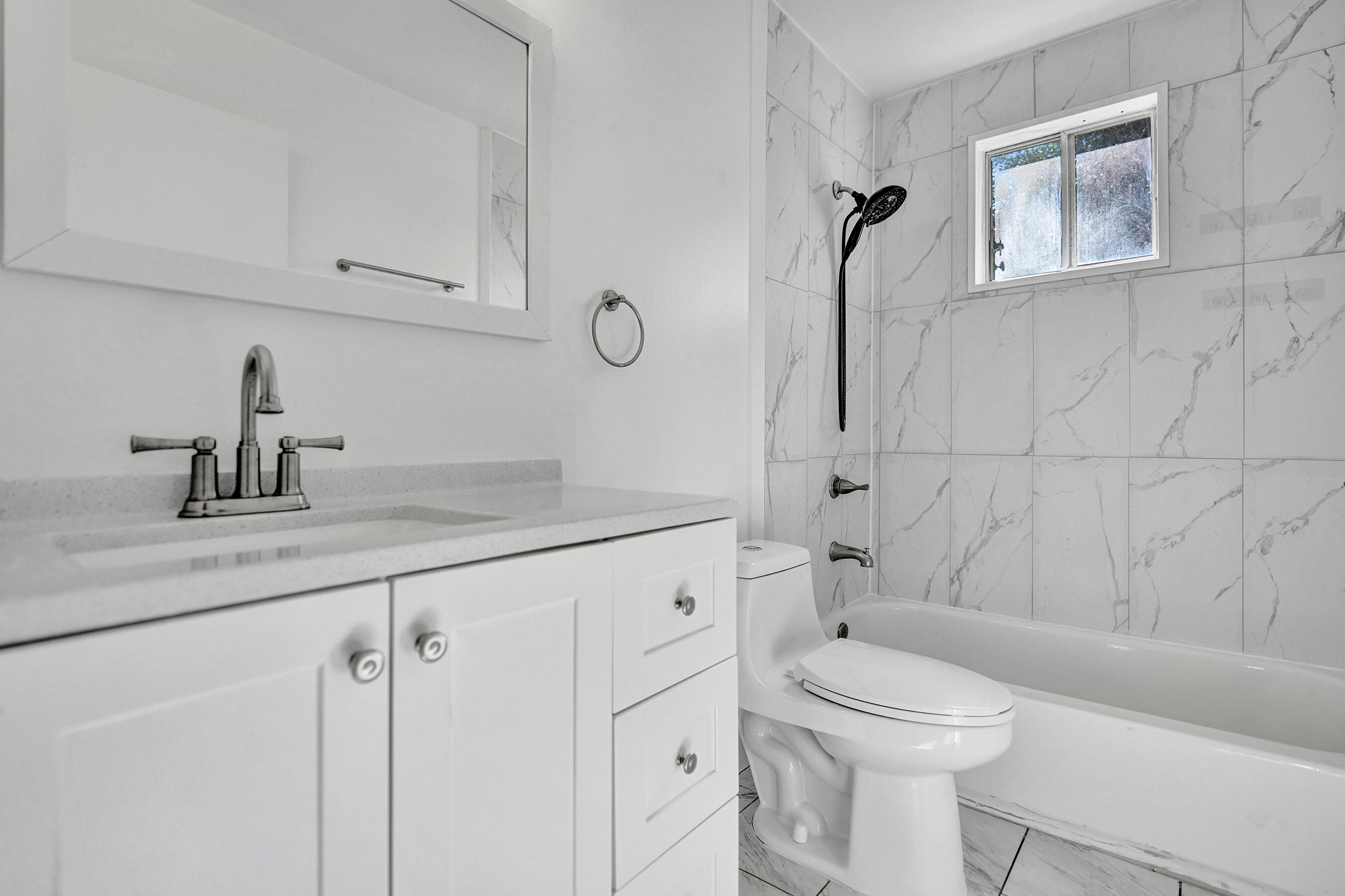 9855 Robins Nest Road Boca Raton, FL 33496 - Photo 47 of 84 a bathroom with a granite countertop sink a toilet and shower