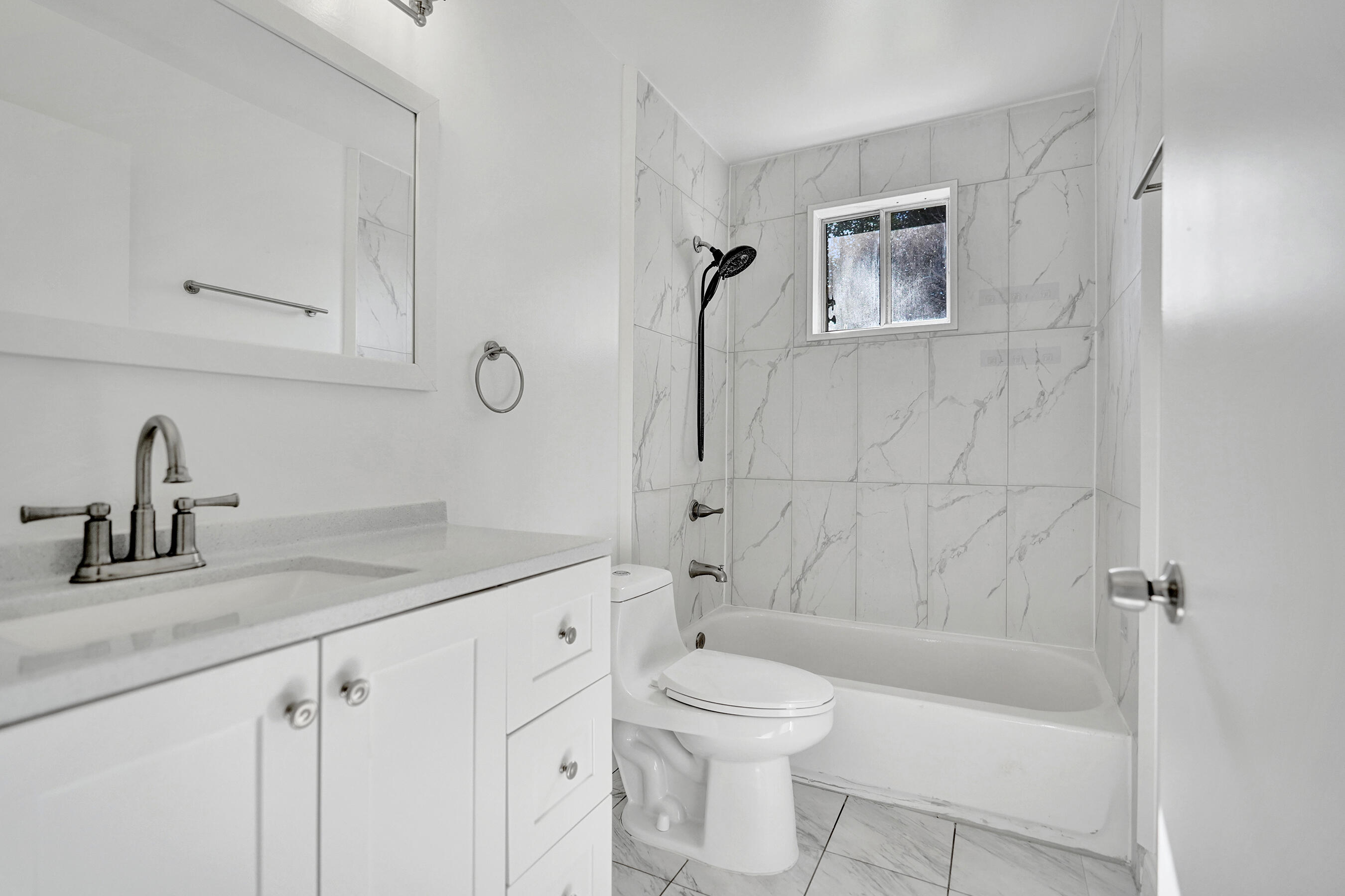 9855 Robins Nest Road Boca Raton, FL 33496 - Photo 48 of 84 a bathroom with a granite countertop sink a toilet and bathtub
