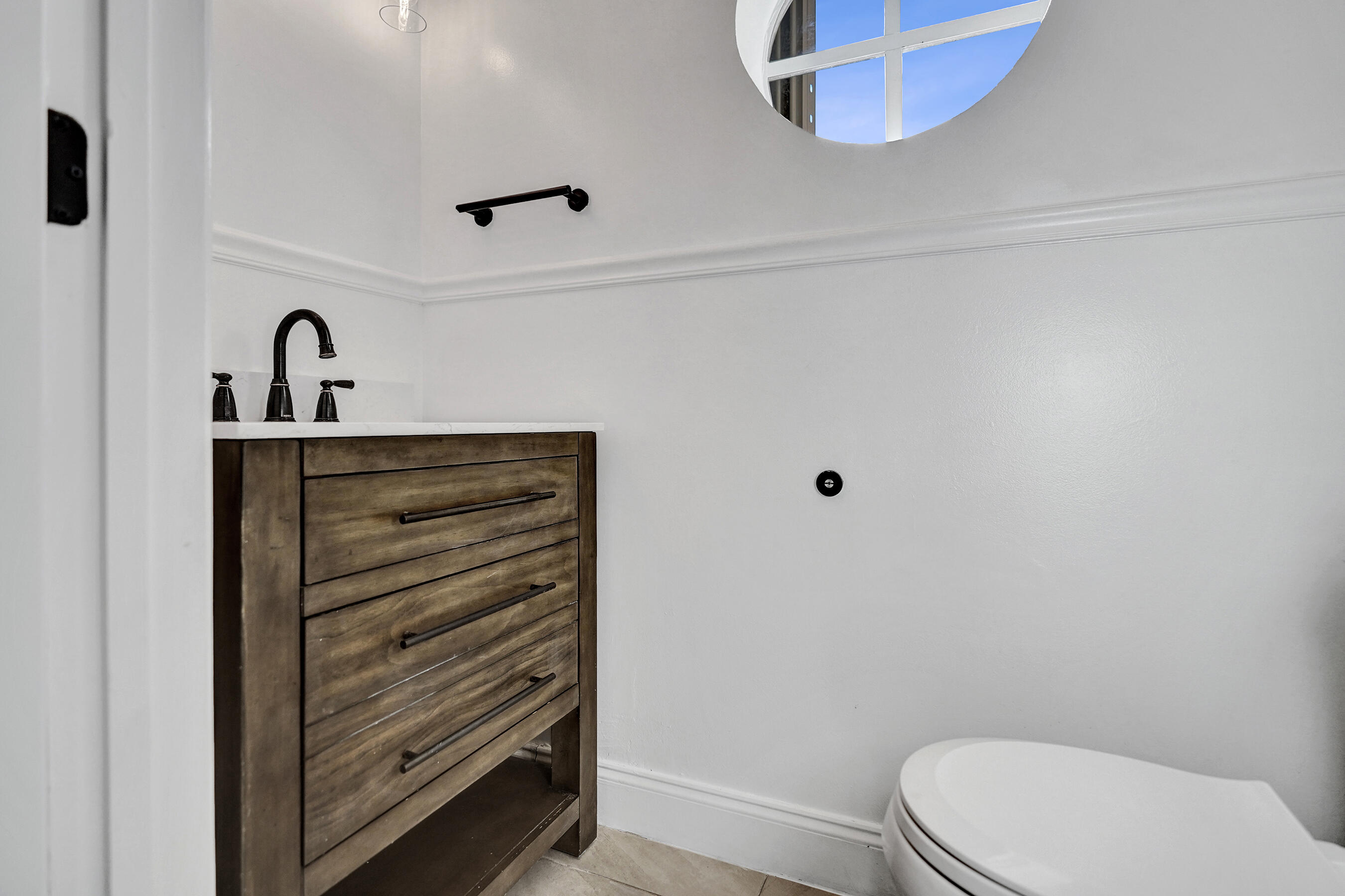 9855 Robins Nest Road Boca Raton, FL 33496 - Photo 49 of 84 a bathroom with a toilet and a sink