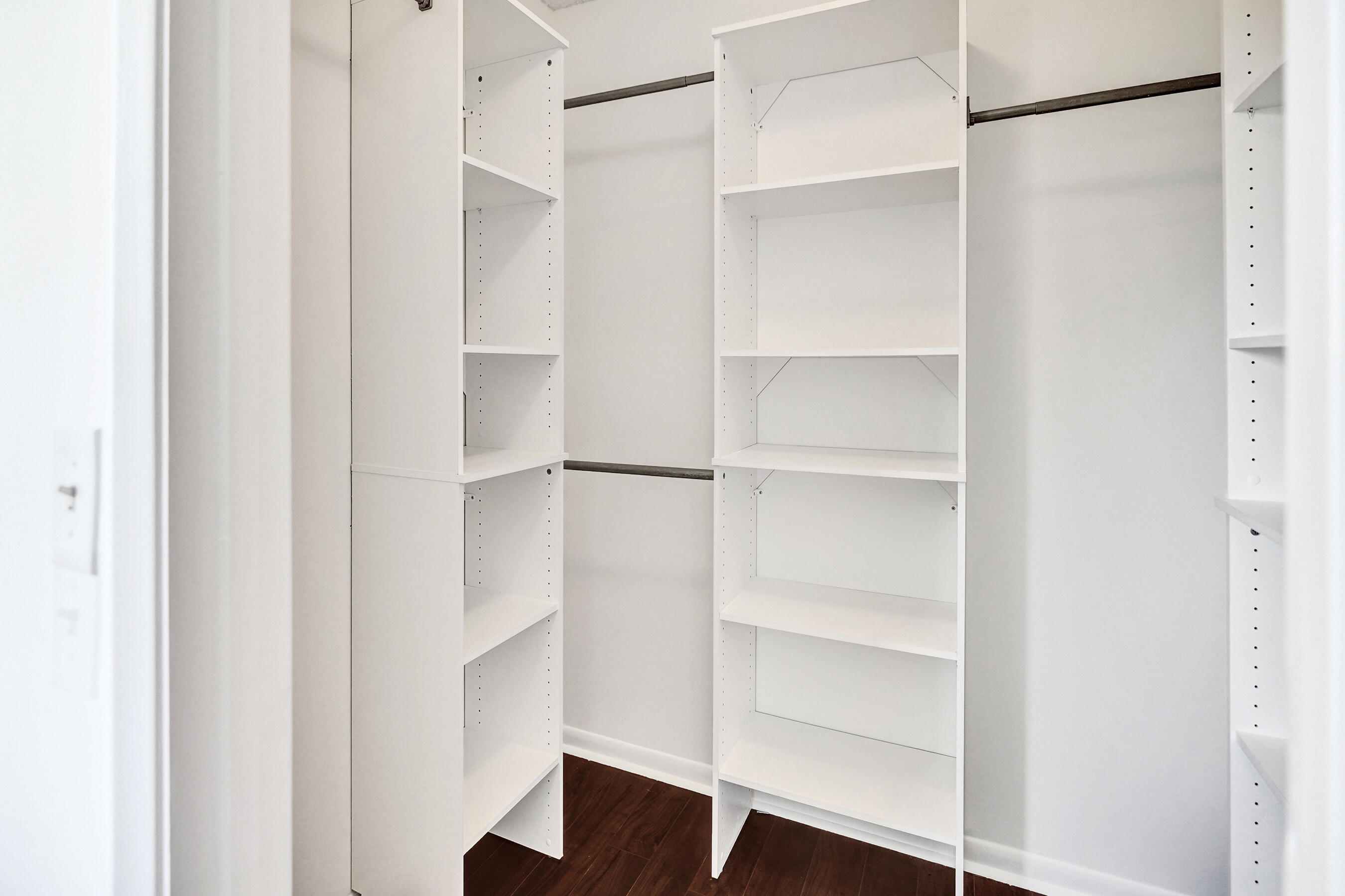 9855 Robins Nest Road Boca Raton, FL 33496 - Photo 50 of 84 a view of walk in closet with empty racks