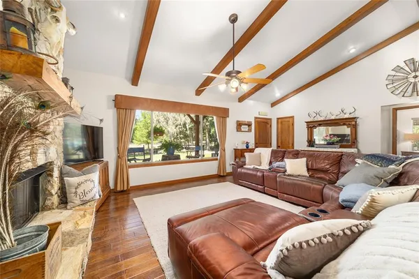 a very nice looking dining room with a large window