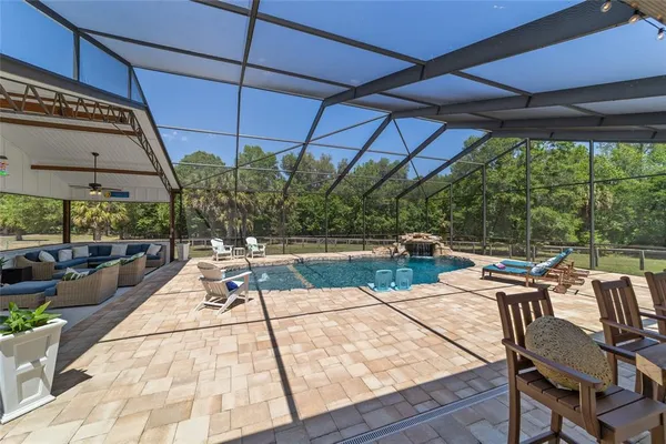 a view of a swimming pool with an ocean view