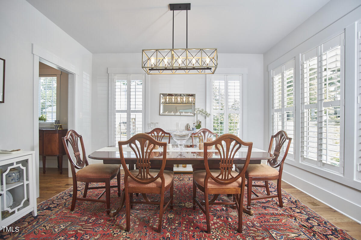 1019 Glascock Street Raleigh, NC 27610 - Photo 8 of 45 a view of a dining room with furniture window and outside view