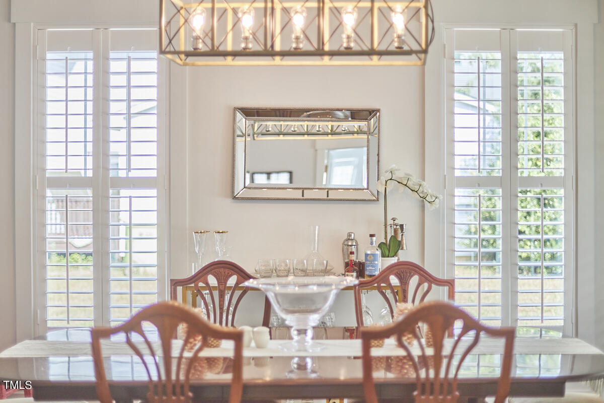 1019 Glascock Street Raleigh, NC 27610 - Photo 9 of 45 a view of a dining room with furniture window and outside view
