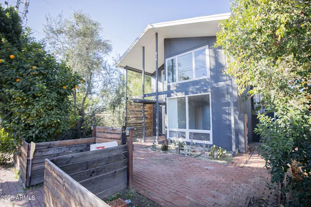 a view of house with outdoor space and street view