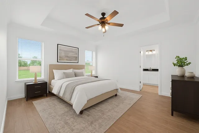 a bedroom with a beds and a dresser