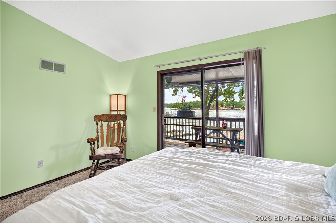 2084 Spring Cove Road Sunrise Beach, MO 65079 - Photo 24 of 63 Bedroom 1