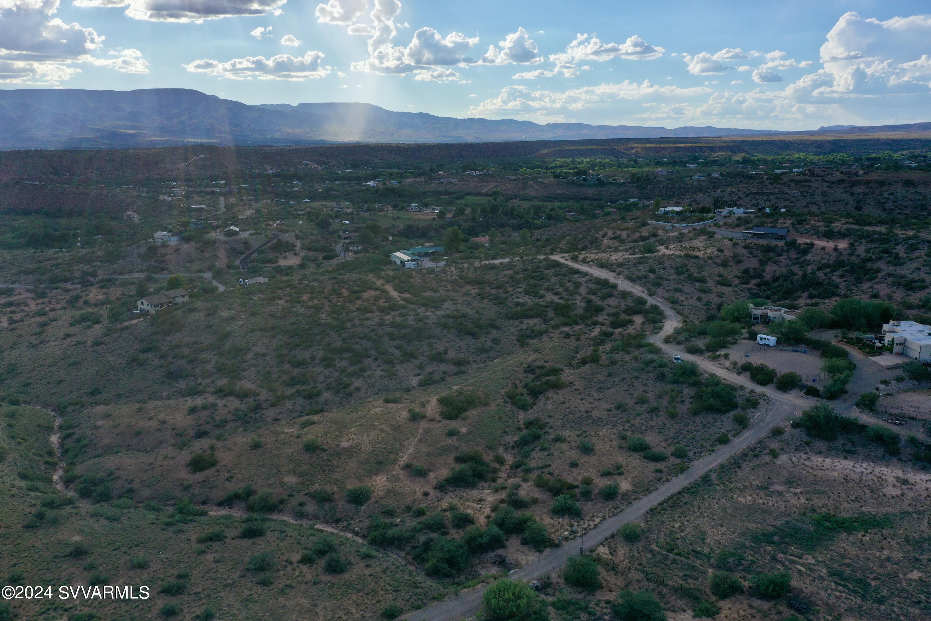 11675 Diamond Vw Road Cornville, AZ 86325 - Photo 9 of 24 a view of a big yard with lots of green space