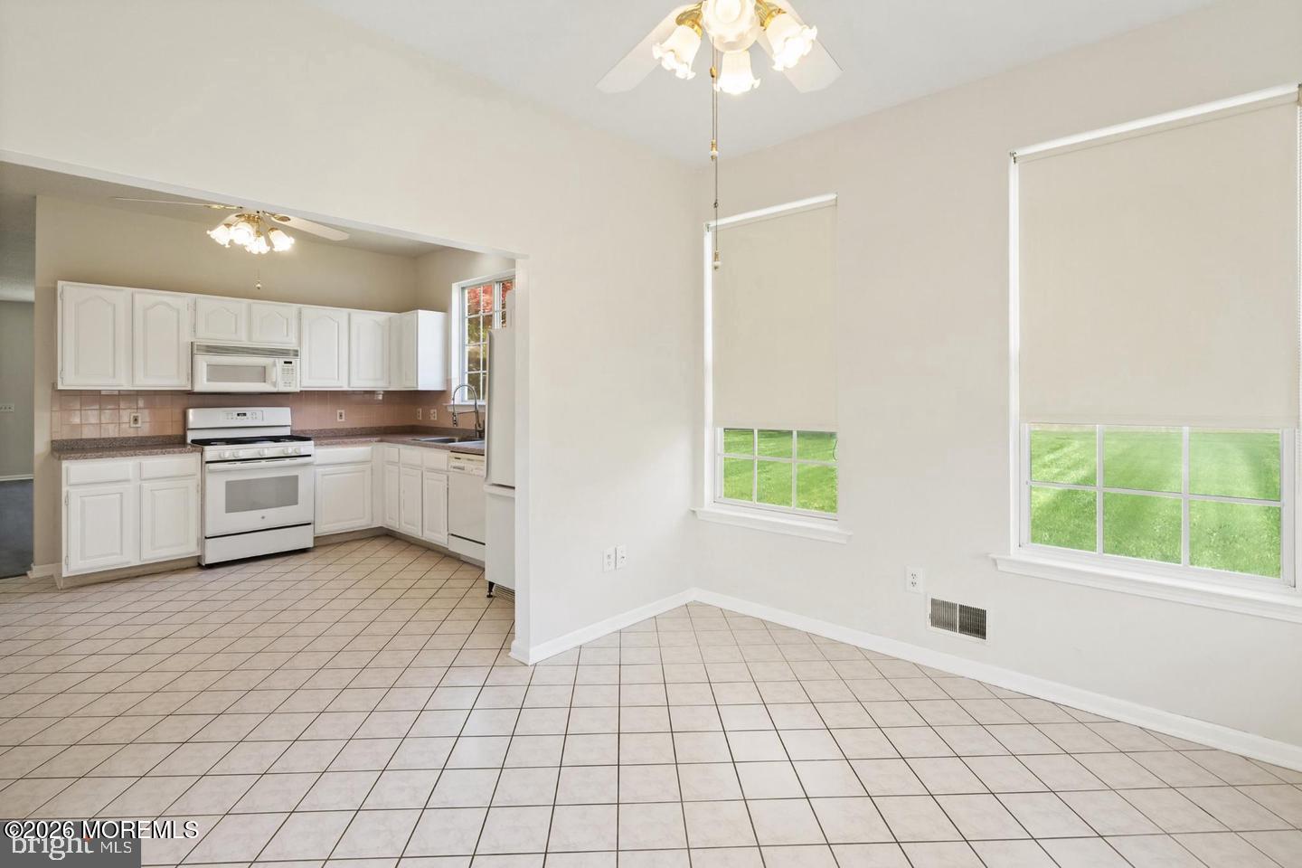 43 Osprey Place Barnegat, NJ 08005 - Photo 18 of 34 a view of kitchen with granite countertop cabinets and window