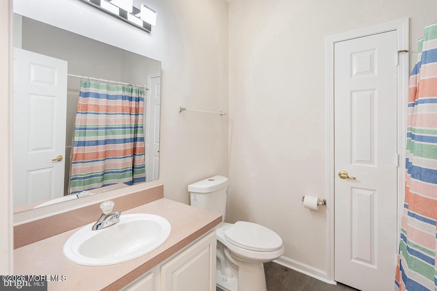 43 Osprey Place Barnegat, NJ 08005 - Photo 25 of 34 a bathroom with a sink toilet and shower