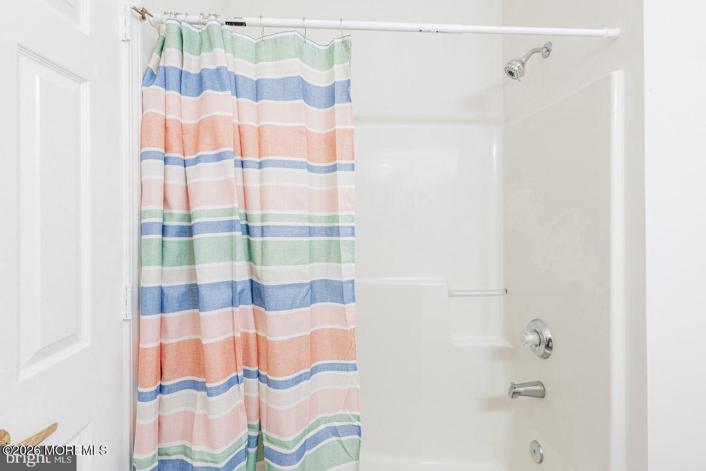 43 Osprey Place Barnegat, NJ 08005 - Photo 27 of 34 a bathroom with a shower curtain