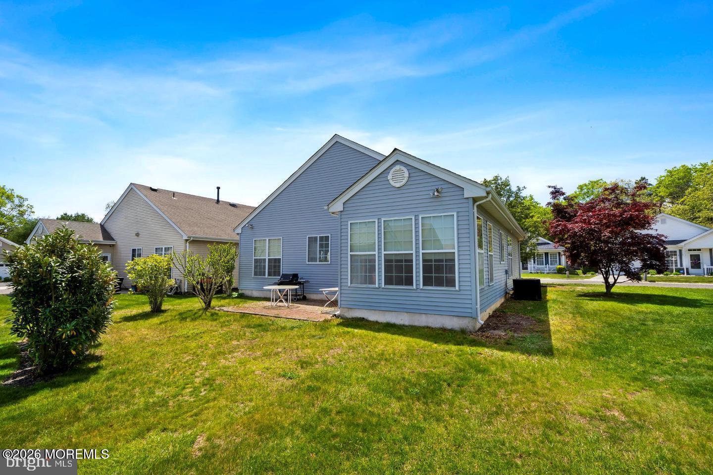 43 Osprey Place Barnegat, NJ 08005 - Photo 10 of 34 a front view of a house with garden
