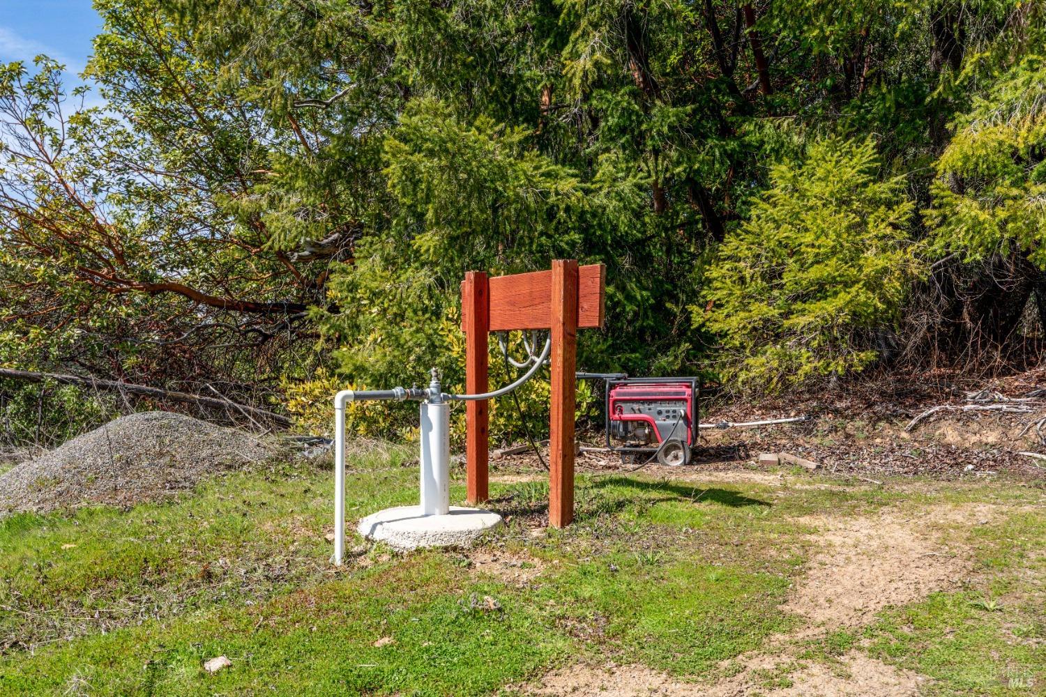 20401 Tomki Road Redwood Valley, CA 95470 - Photo 12 of 35 a sign that is on the side of the road
